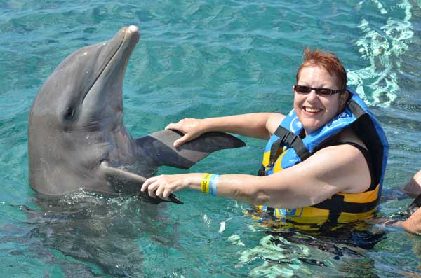 Melody-Rose Dancing with Dolphin