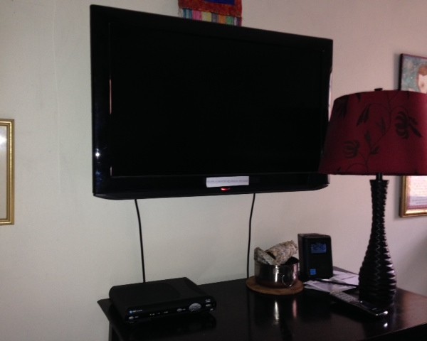My TV less than 5 feet from my bed